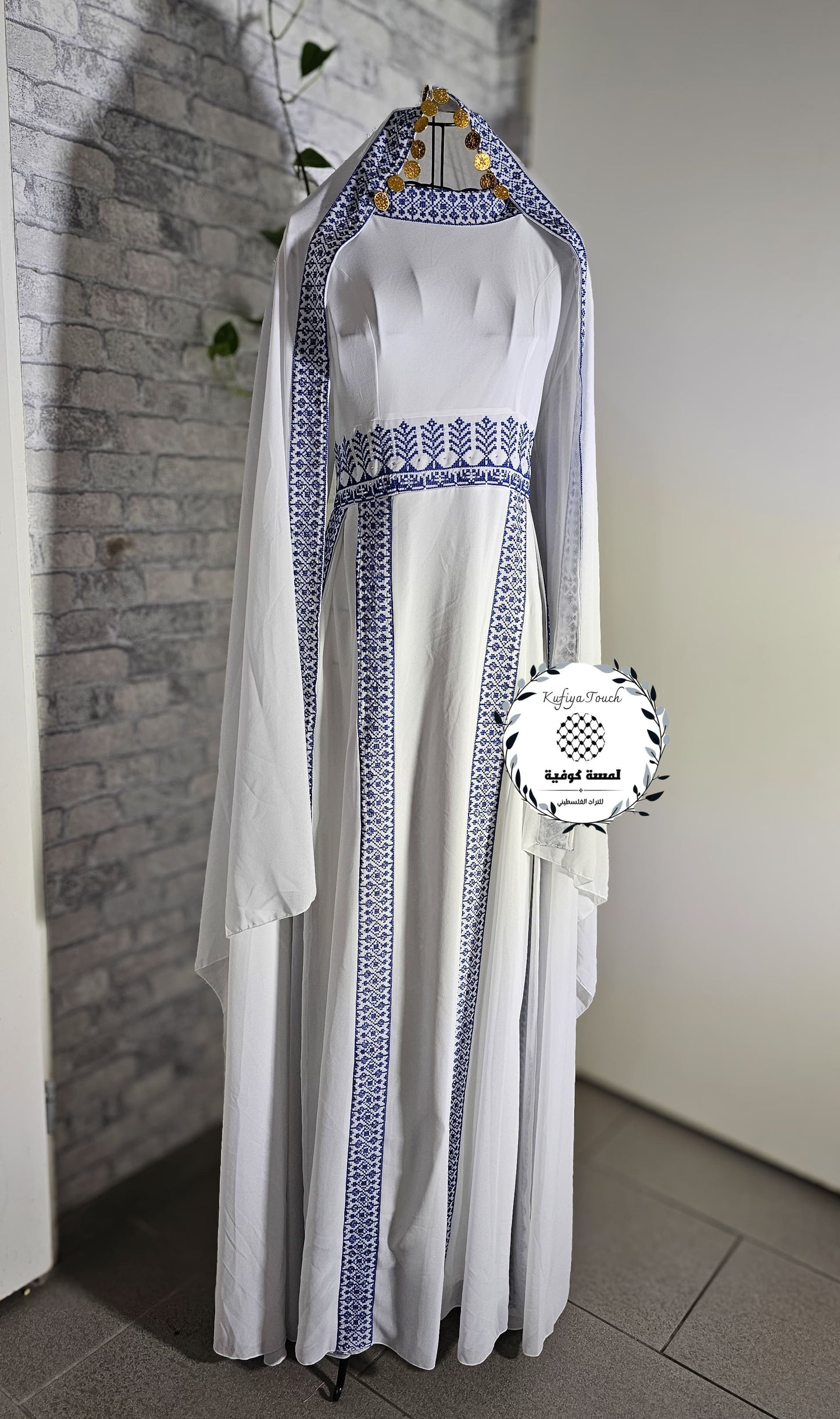 wit-blauw thobe