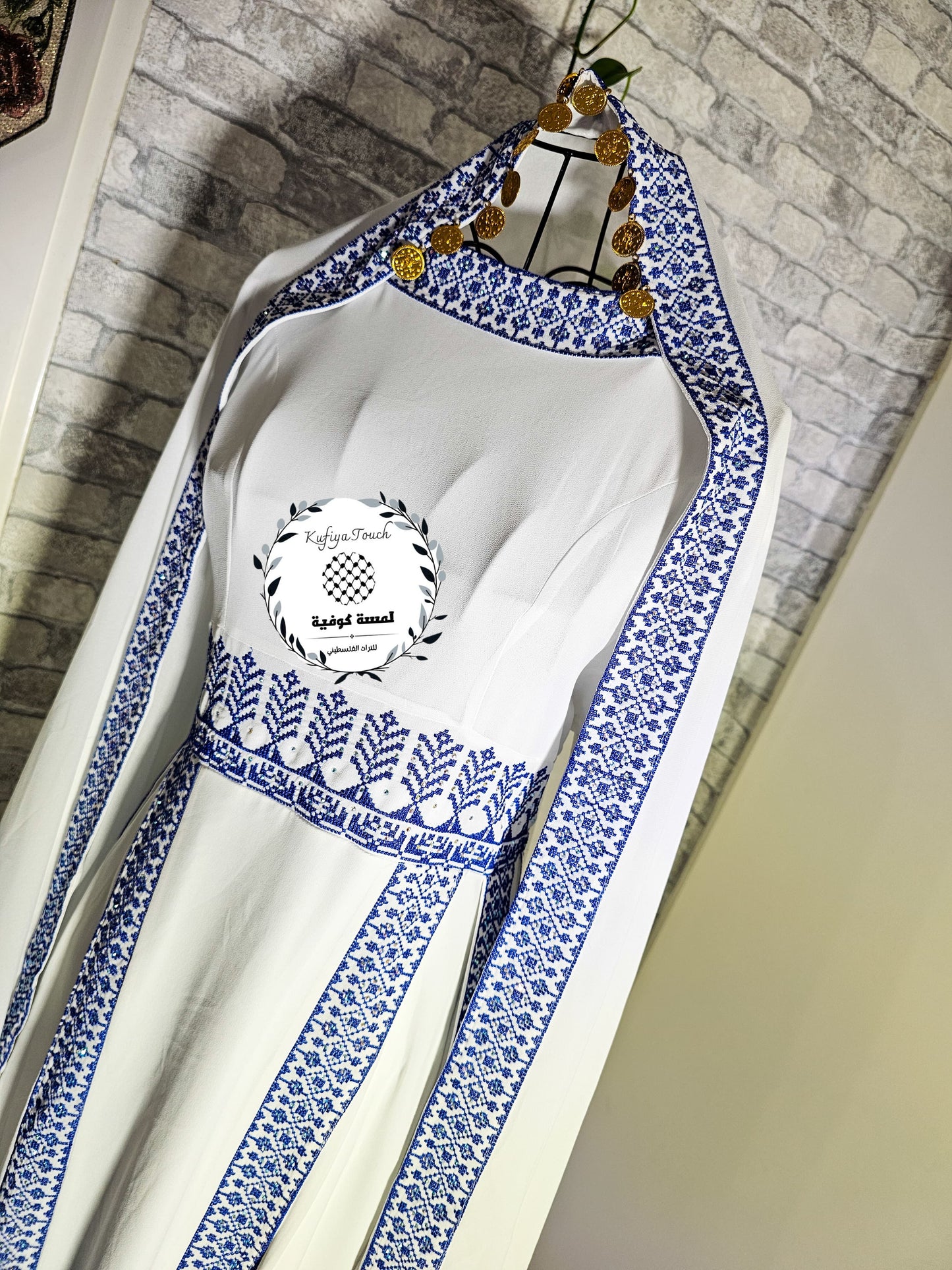 wit-blauw thobe